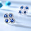 Round Blue Nano Sapphire Halo Stud Earrings in 0.925 White Sterling Silver (MDS210271)