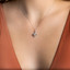 5/8 CTW Round Diamond Clover Halo Pendant Necklace in 18K White Gold (MD190525)