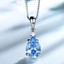 2 4/5 CTW Pear Blue Nano Topaz 4-Prong Solitaire with Accents Pendant Necklace in 0.925 White Sterling Silver With Chain (MDS230068)