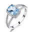 2 2/5 CTW Cushion Blue Nano Topaz Split-shank Cushion Halo Cocktail Ring in 0.925 White Sterling Silver with Accents (MDS230089)