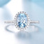 2 7/8 CTW Oval Blue Nano Topaz Oval Halo Cocktail Ring in 0.925 White Sterling Silver with Accents (MDS230099)
