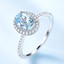 2 7/8 CTW Oval Blue Nano Topaz Oval Halo Cocktail Ring in 0.925 White Sterling Silver with Accents (MDS230100)