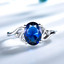 2 1/2 CTW Oval Blue Nano Sapphire Solitaire Cocktail Ring in 0.925 White Sterling Silver (MDS230137)