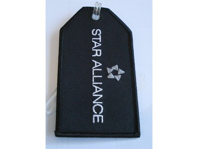 star luggage tag