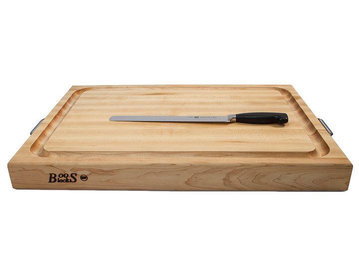 John Boos Reversible Cutting Board With Handles & Juice Groove 24x18x2.25 (RAFR2418) Side View With Knife