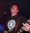 K of Denmark's Scrotum wearing the Sigh Co. Cthulhu Knot T-shirt on stage