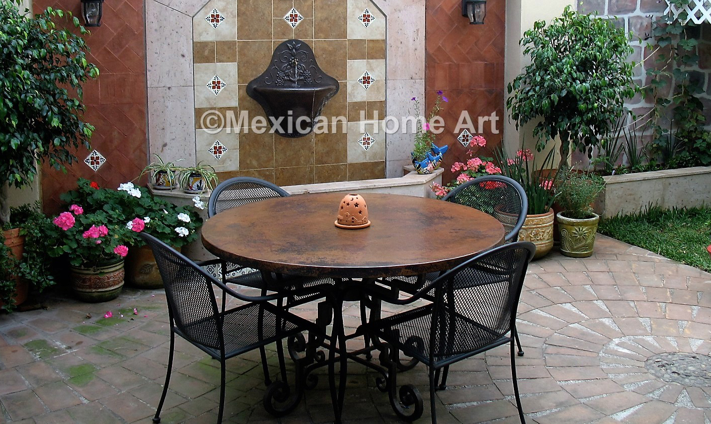 round-hammered-copper-table-top.jpg