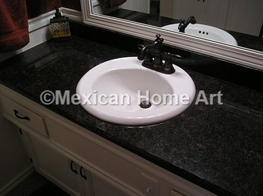 bathroom sink installed before replacing with one of our copper sinks
