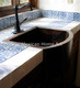 Copper -farmhouse-sink-single-well-rounded-front-installed-Somber