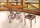 "Celaya" Copper Dining Table and Arm Chair