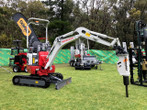 Takeuchi TB210R with a Demoter S85 rock breaker from Digrite