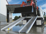 Tractor unloading with Sureweld Loading Ramps for sale at Digrite