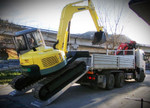 Excavator loading with Digga Universal loading ramps sold at Digrite