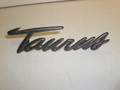 1996-1999 Ford Taurus Rear Bumper Emblem Trim (Taurus) Paint to Match F6DZ-17E939