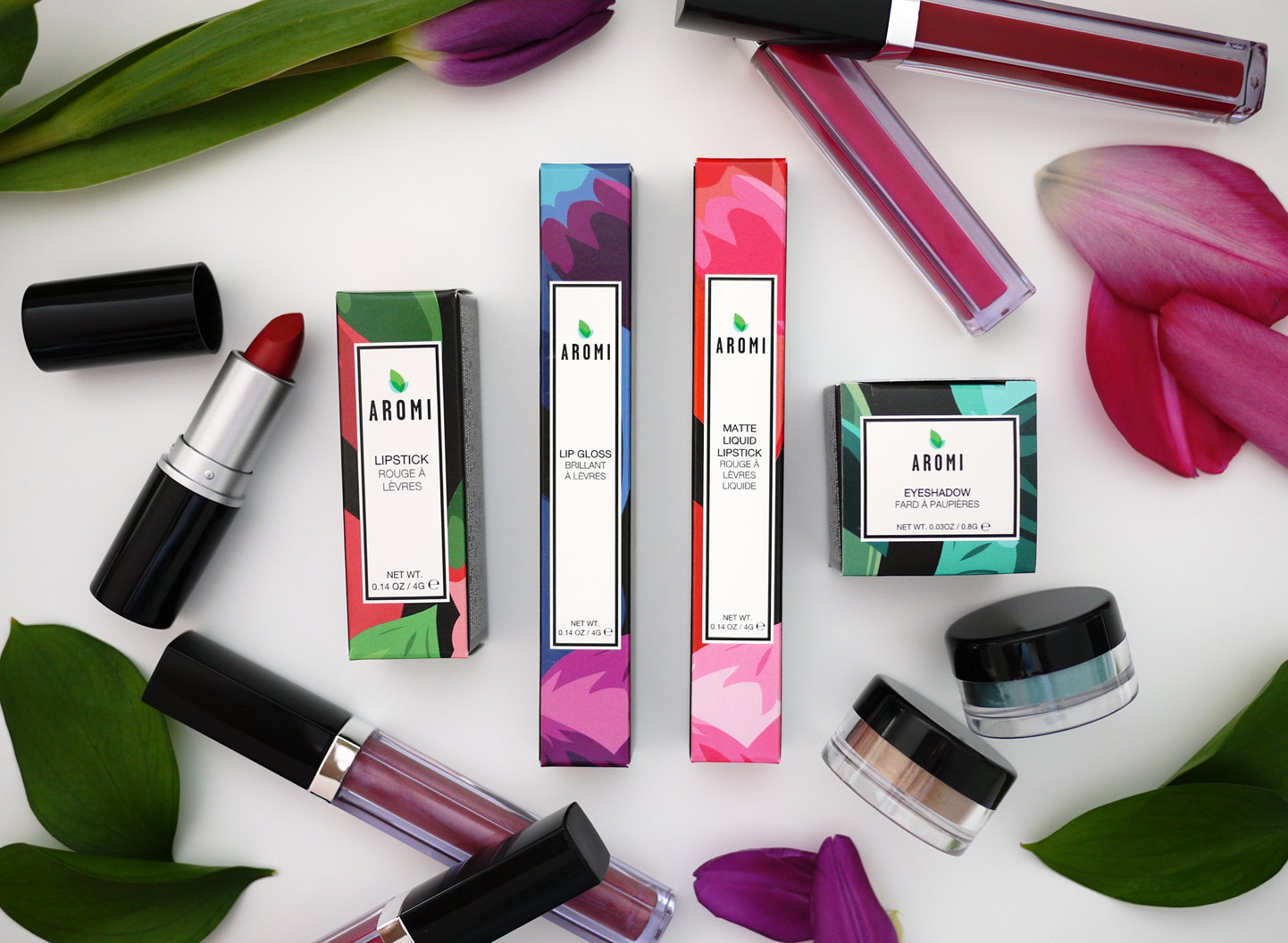 Aromi lipstick, lip gloss, glossy-to-matte liquid lipstick, and loose mineral eyeshadow