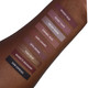 Aromi brown, nude and caramel swatches on dark skin