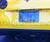 C7 Corvette Smoke Acrylic Bubble license plate Shield Installed on Yellow Corvette