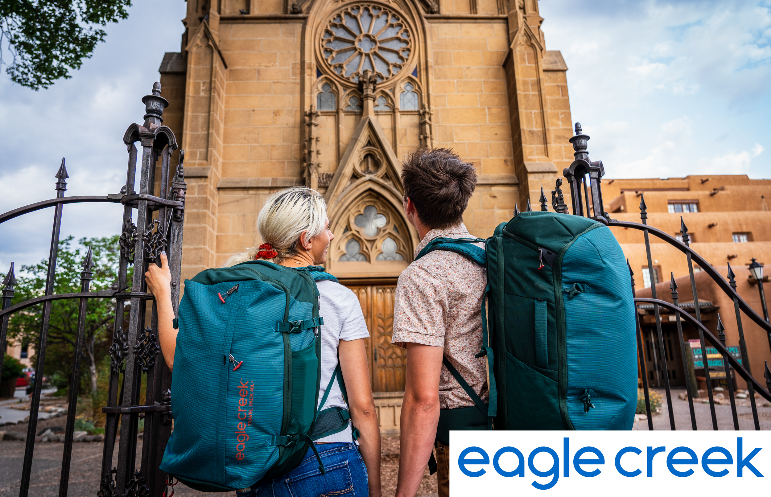 Tourist with Eagle Creek gear Looking at Church
