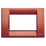 A rusty red colored square cover plate. a white square middle. on a white background
