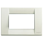 An ivory colored Idea plate cover. Square. White center with a with background