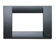 A dark grey classica cover plate. square with white square middle. On a white background