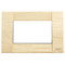 A square wooden cover plate. Light colored with grains. White square center. On a white background