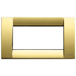 a polished gold shiny rectangular cover plate. a hollow inside, on a white background