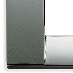 A shiny chrome bottom left corner. square, sharp. L shape. On a white background