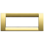 A polish gold skinny rectangle cover plate. Hollow inside. On a white background