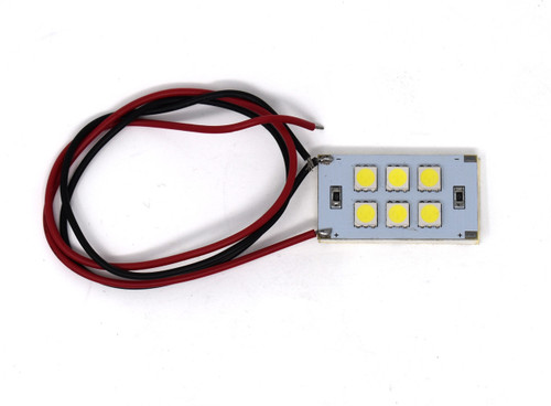  Atlas 6SMD-5050 White.  A rectangle with yellow square lights on it. Grey board. With red and black wire coming from it. On a white background