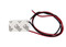 the back of Atlas 6SMD-5050 White. A white rectangle 3M back. red and black wires coming from it. On a white background