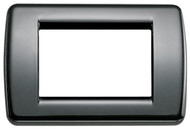 Black square/ rectangular  plate cover. Light shine. On a white background 