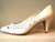 Cutout leather white pumps