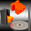 Inside Ring Engraving Block for the Graver Slide™ Sharpening System pictured with the Graver Slide™ Tower, sharpening wheels, and a picture of a graver made with this Graver Block.
