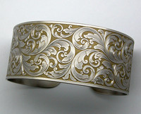 Example of bracelet with Arnaud's Hand Engraving design for a Bracelet with Scrolls