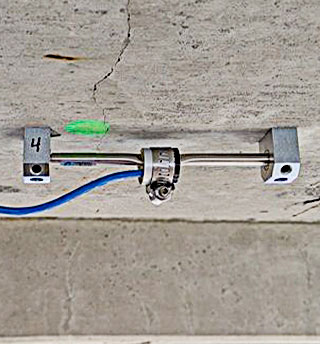Photo of a GEOKON Model 4000 Vibrating Wire Strain Gauge installation.