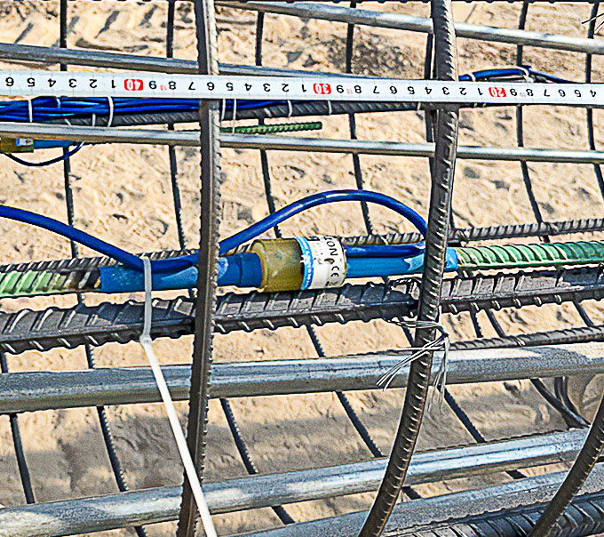 Photo of a Model 4911 Rebar Strainmeter installation.