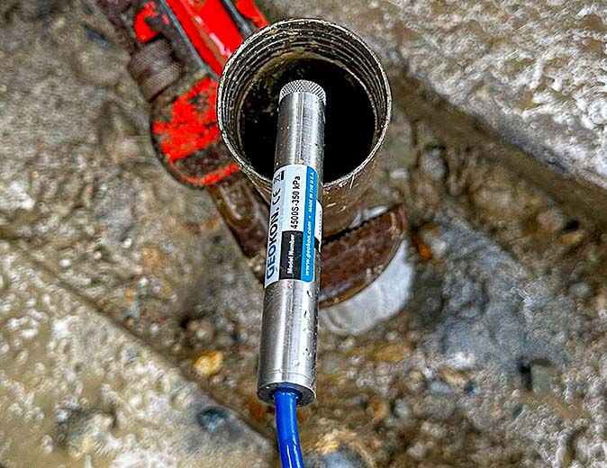 Photo of Model 4911 Rebar Strainmeter installation.