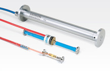 Model 4202 (front), Model 4200 (center, shown with plucking coil) and Model 4210 (rear) Concrete Embedment Strain Gauges.