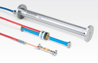 Model 4202 (front), Model 4200 (center, shown with plucking coil) and Model 4210 (rear) Concrete Embedment Strain Gauges.
