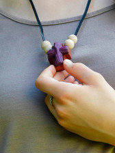 PURPLE ROPED CLAY ON WOODEN CROSS NECKLACE WITH FOUR BEADS