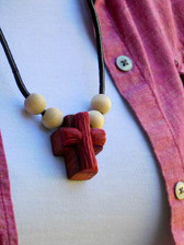 MAROON ROPED CLAY ON WOODEN CROSS NECKLACE WITH FOUR BEADS
