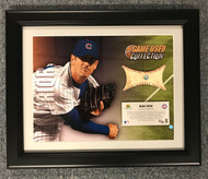 Upper Deck has specially designed this "MLB Game-Used Collection" keepsake, which includes an action photo of Mark Prior coupled with a piece of a game-used baseball (approximately 2'' in diameter) used during an official Chicago Cubs MLB game.