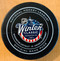 The pucks used in the 2015 Bridgestone NHL Winter Classic all featured the unique NHL Winter Classic 2015 logo for this game only.