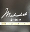 This signature is big and bold (over 4 inches long) with the added inscription of the date he signed (6-29-01).