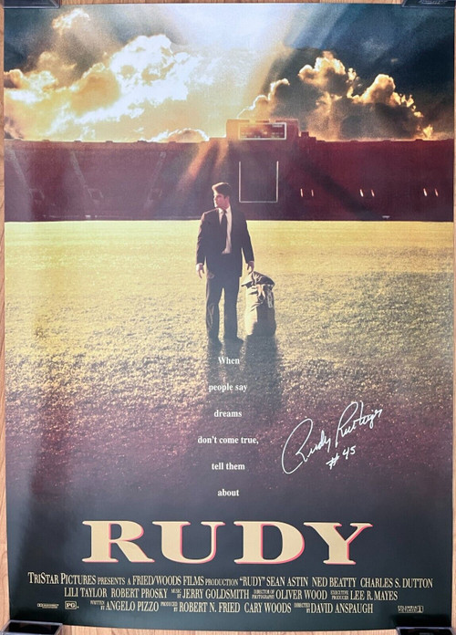 Rudy Ruettiger Autographed Movie Poster signed by the real Rudy Ruettiger with the added uniform #45. 