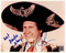Chevy Chase authentic signed Three Amigos 8x10 Color Movie Photo with added inscription "Wet Backs Ahoy."  One never knows what to expect at a Chevy signing......
