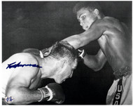 This is a rare 8x10 action photo from their fight that has been autographed by Tunney Hunsaker.