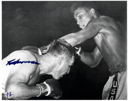 This is a rare 8x10 action photo from their fight that has been autographed by Tunney Hunsaker.