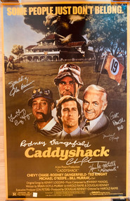 Signed by Rodney Dangerfield, Chevy Chase, Michael O'Keefe, Cindy Morgan, Hamilton Mitchell, John Barmon and Scott Powell.